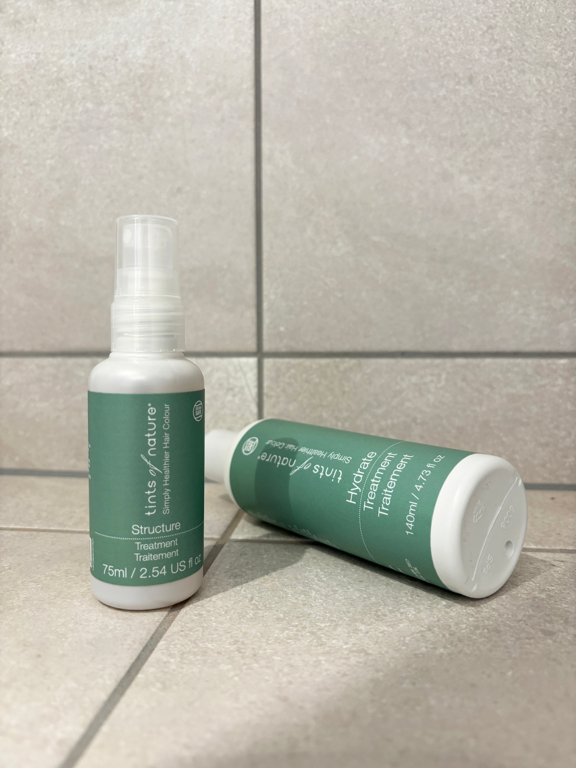A bottle of Structure and Hydrate Treatment in a bathroom 